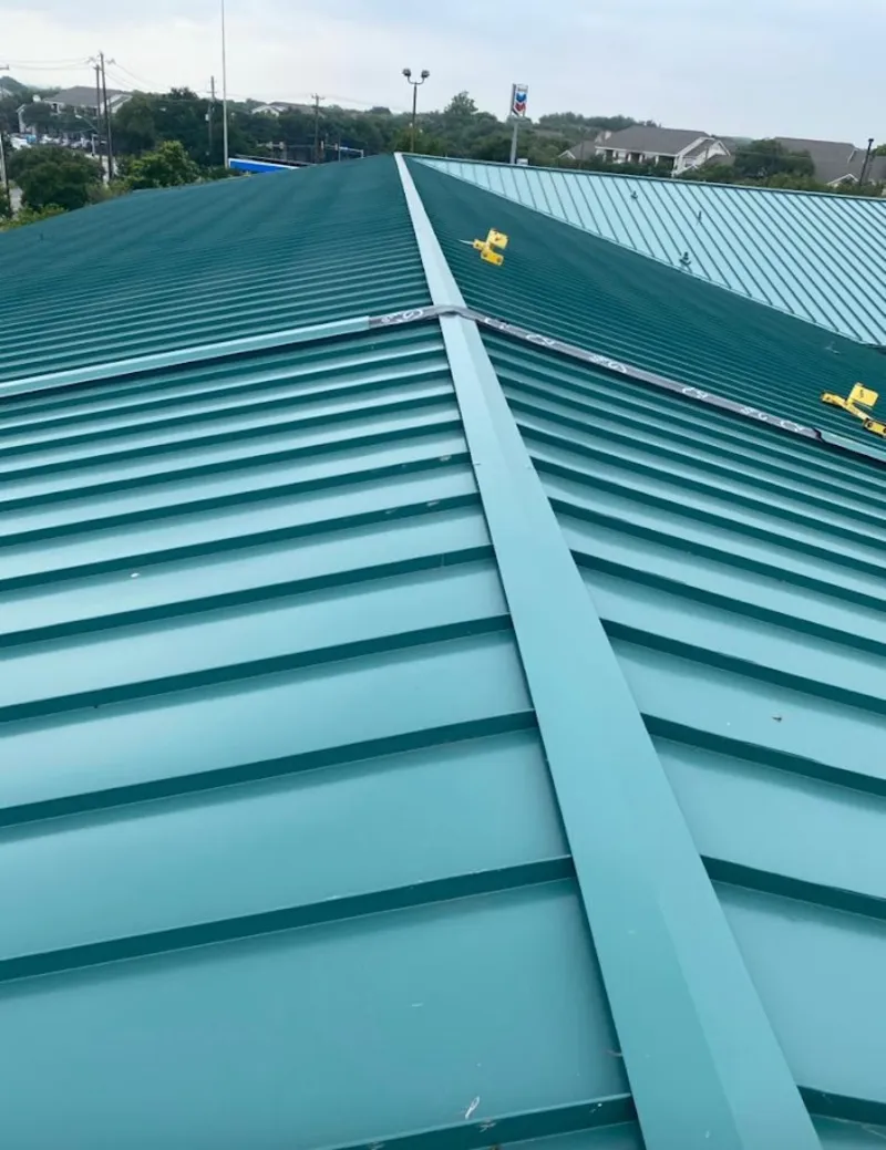 Green commercial metal roof ridge and valley for Metal Roof Repair in Berwick